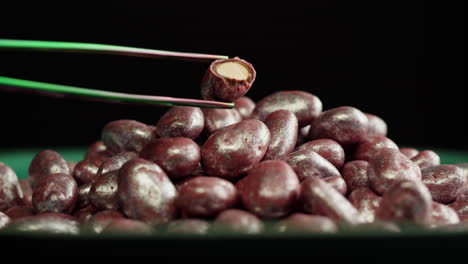 purple chocolate covered almonds with silver dust
