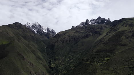 huamanchoque mountain peak in peru - aerial pullback