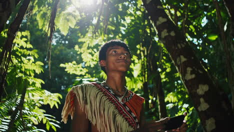 teenager taking photo in rainforest