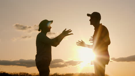 couple arguing at sunset