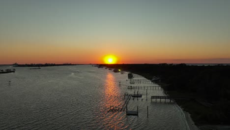 aerial view of sunset over inlet waterway near wolf bay