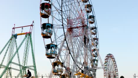 ferris wheels building pan shot day maharashtra india