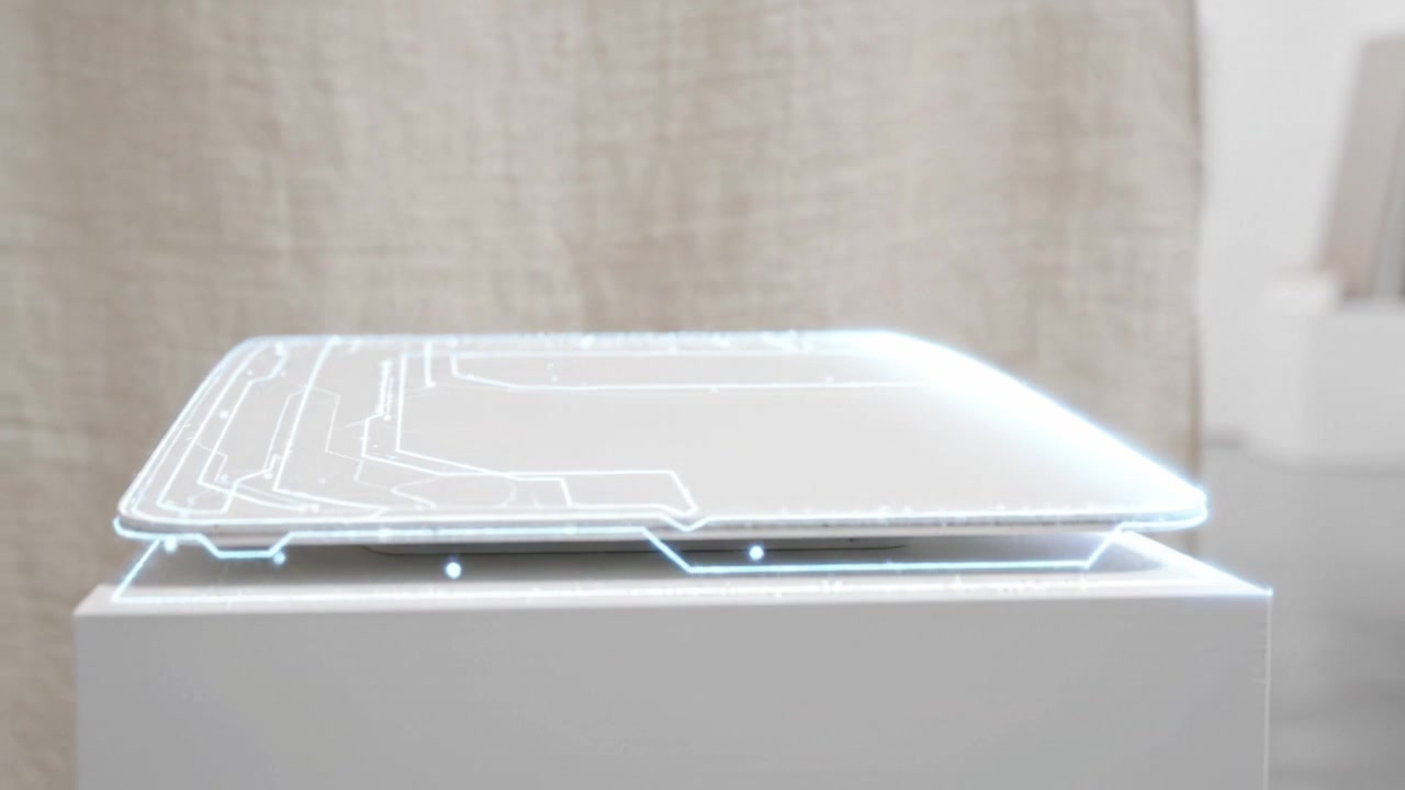 Minimalist White Display Platform Against a Soft Fabric Background Highlighting Modern Art Installation Aesthetic and Contemporary Presentation Techniques