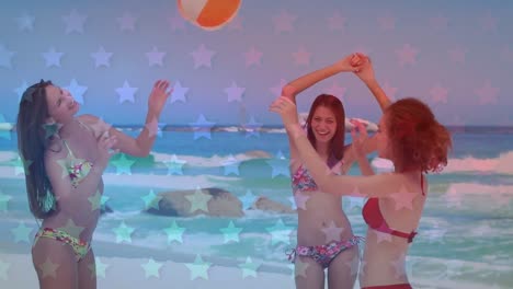 multiple star icons against group of caucasian female friends playing with ball at the beach