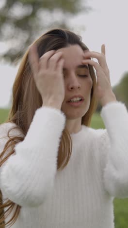 a peaceful moment in nature with a woman in a white sweater
