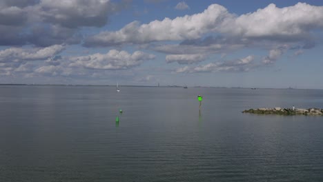 droning towards a sailboat in a peaceful bay in texas