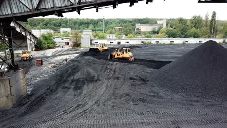 coal mining and processing. excavator car digging the ground works in construction site