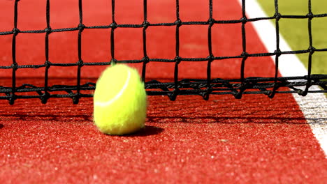 tennis balls hitting the net