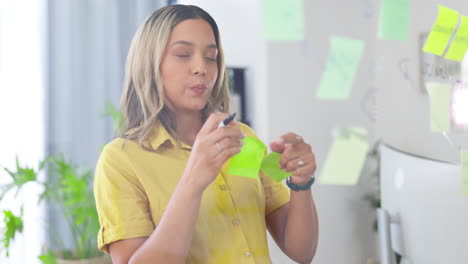 Happy-woman,-writing-and-sticky-note-in-planning