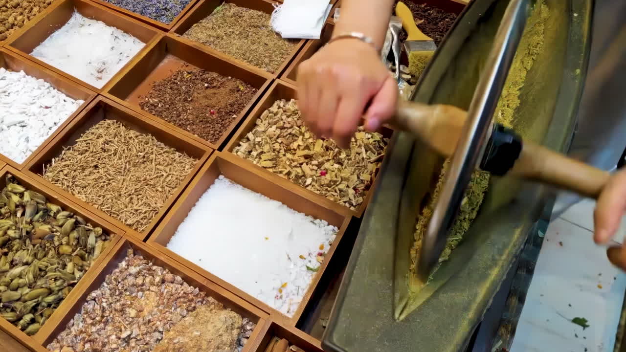 Scene of Traditional Chinese Medicine, Mortar and Pestle, practitioner grinding milling medicinal materials treatment ingredients aromatherapy herbs in stone boat tool