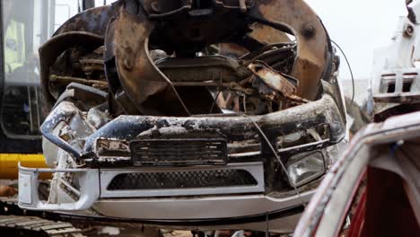 excavator machine being operated in the junkyard 4k