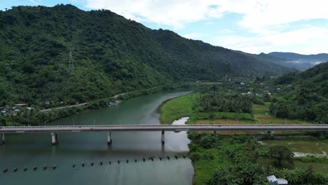 Drone-view-of-old-bridge-and-river-in-Bato,-Catanduanes,-Philippines