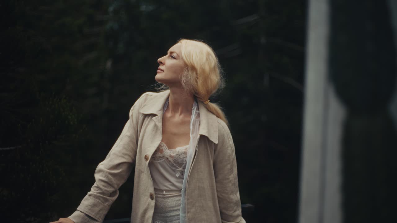 Woman with book outdoors