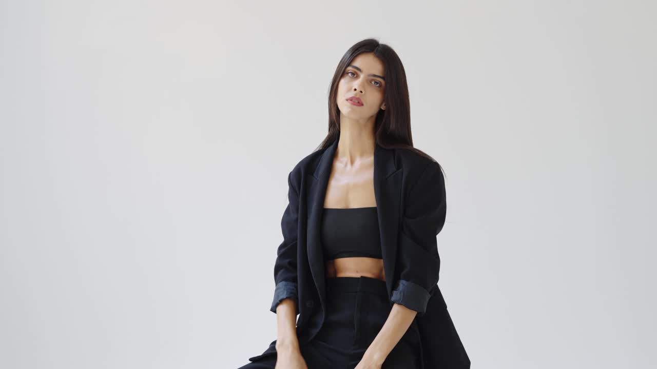 Stylish Woman in Black Blazer and Crop Top