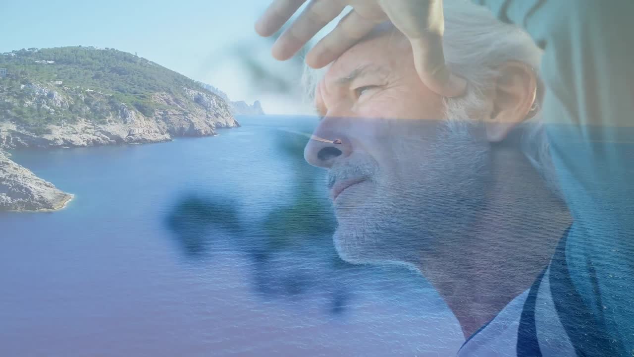 hombre viejo y una vista del océano