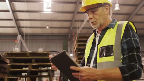 worker using digital tablet