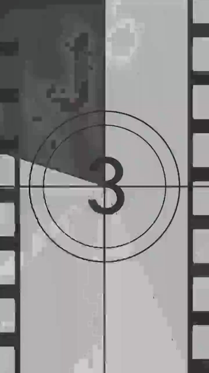 Retro Black and White Film Countdown with Grain and Scratches
