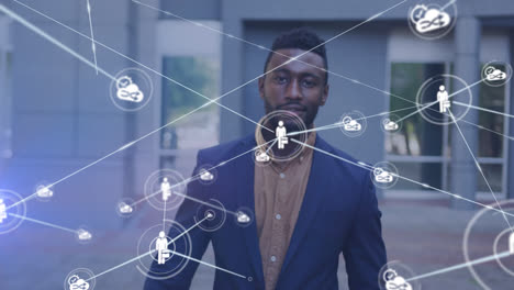 animation of network of connected icons with businessman walking in street smiling