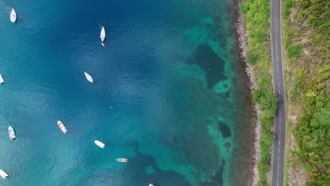 Boats-moored-in-Anse-a-la-Barque,-bay-in-Guadeloupe