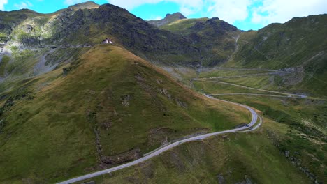 switchbacks wind up mountain pass transfagarasan serpentine road romania, aerial perspective