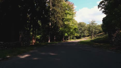 Pushing-through-the-gates-of-a-cemetery-with-a-drone