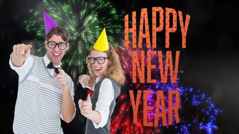 Animation-of-happy-couple-in-glasses-celebrating,-over-happy-new-year-text-and-colourul-fireworks