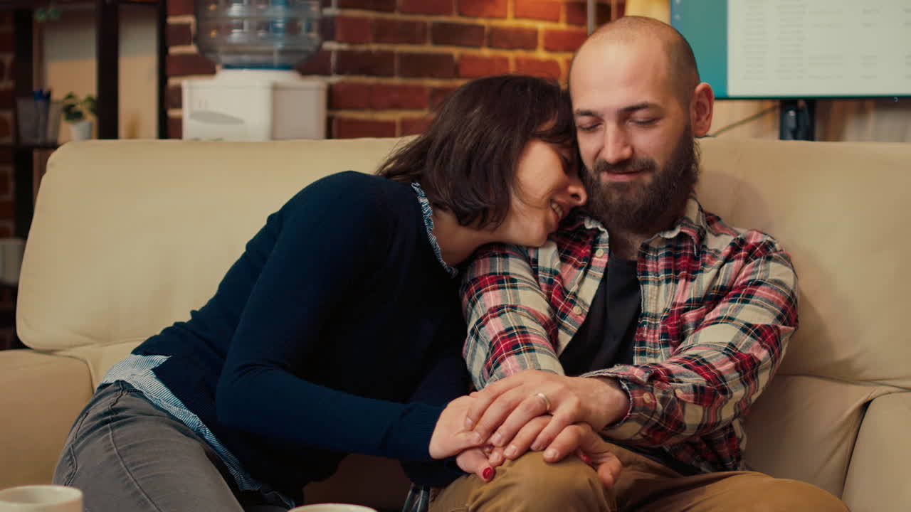 Husband and wife solving marriage problems at therapy session meeting