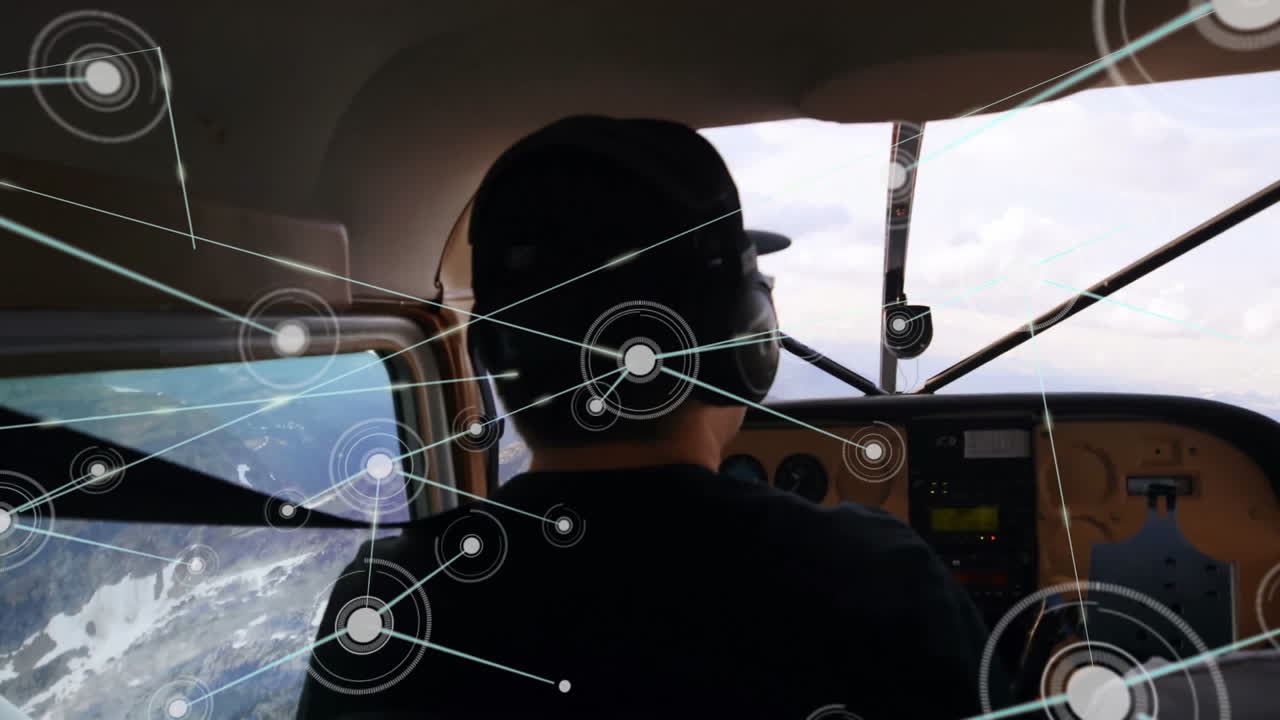Pilot and co-pilot navigating aircraft with network connections animation overlay