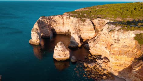 stunning aerial view of coastal rock formations in portugal