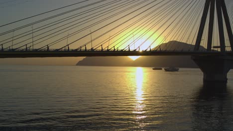 aerial - rio antirrio bridge in greece at sunset - shot on dji inspire 2 x7 raw