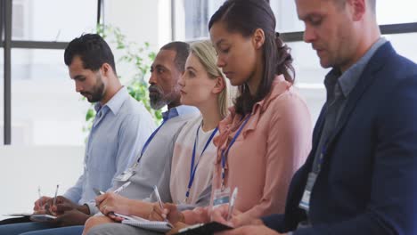 business people attending to a meeting in conference room