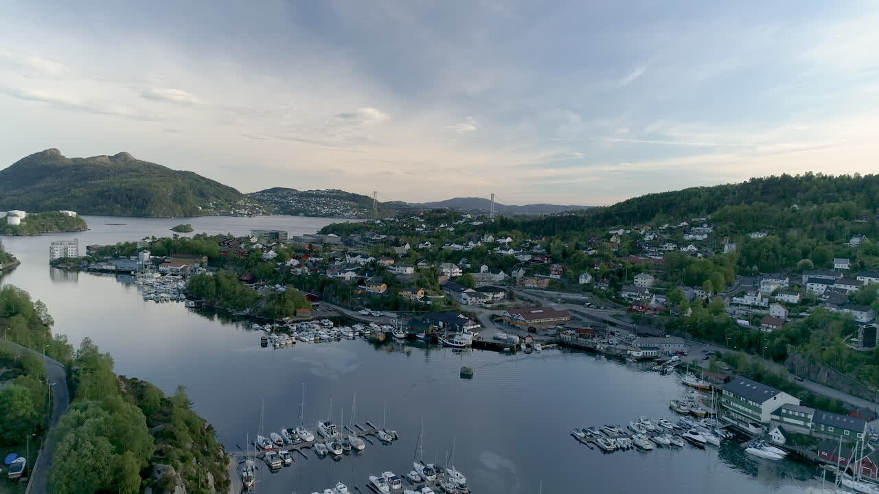Drone shot flying towards the horizen above Ask&oslash;y Marin western Norway