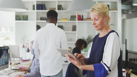 Business-woman-on-her-touch-pad