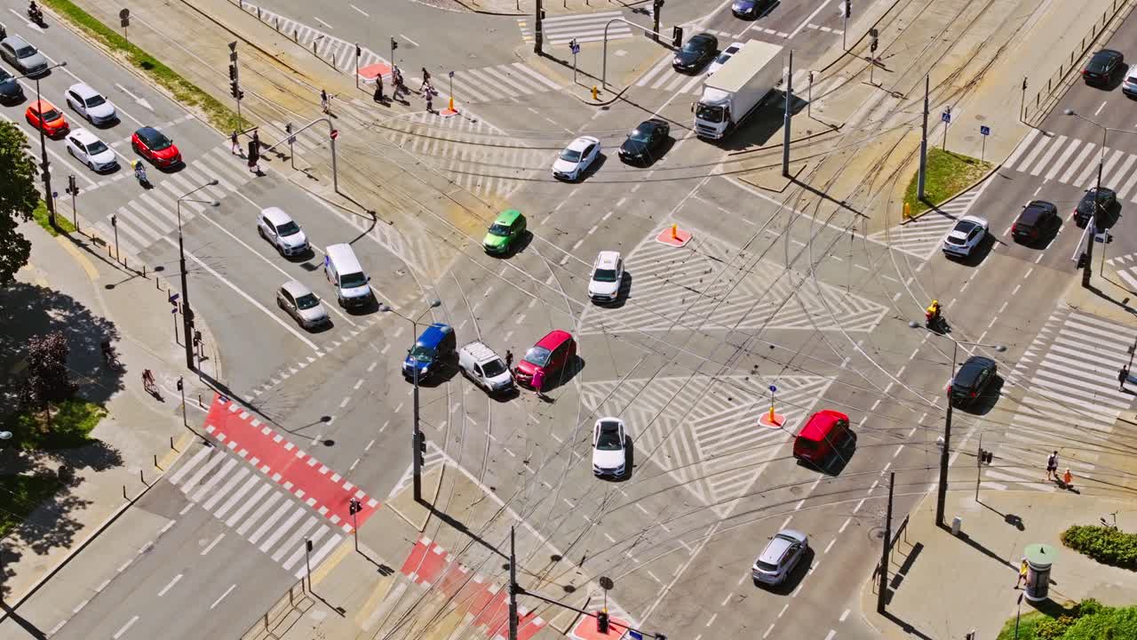 Aerial of Warsaw intersection with two vehicles in head on collision traffic jam
