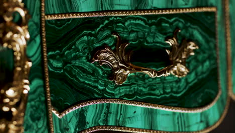 malachite and gold inlaid cabinet detail