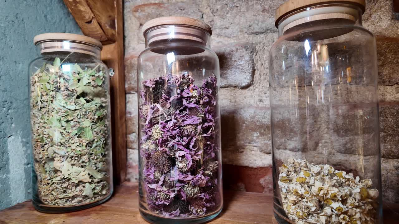 Dried Herbs in Glass Jars
