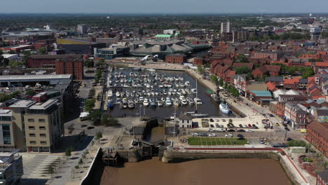 slow aerial flight towards hull marina at medium height