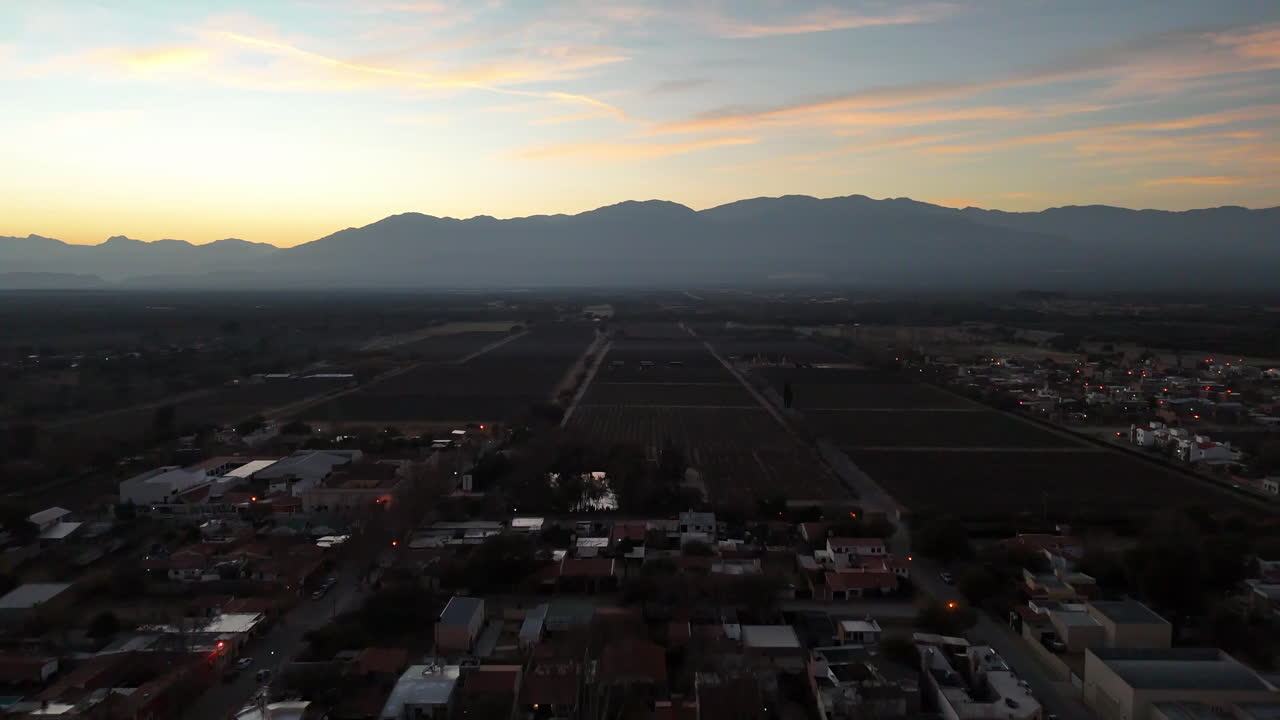 Sunrise over Cafayate, highlighting its vast vineyards of Malbec and Torrontés grapes in northeastern Argentina, Salta province.