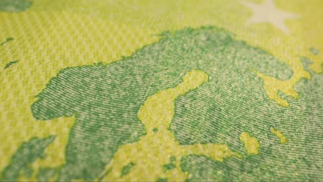 close-up of one hundred euro banknotes close-up. european currency eur, eu central bank. 100 euro money macro. economy, financial and banking concept in european union.