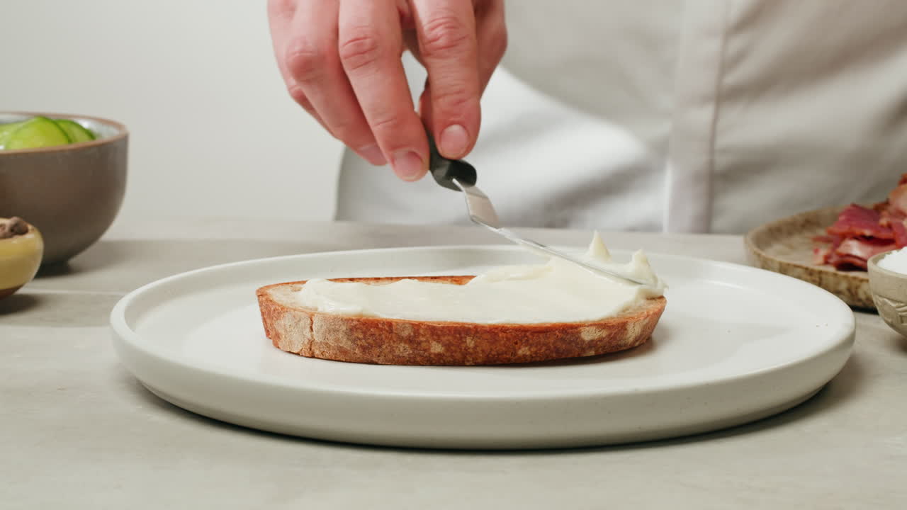 Chef preparing a sandwich