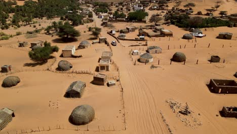 terjit oasis village in sahara desert of mauritania, aerial drone view