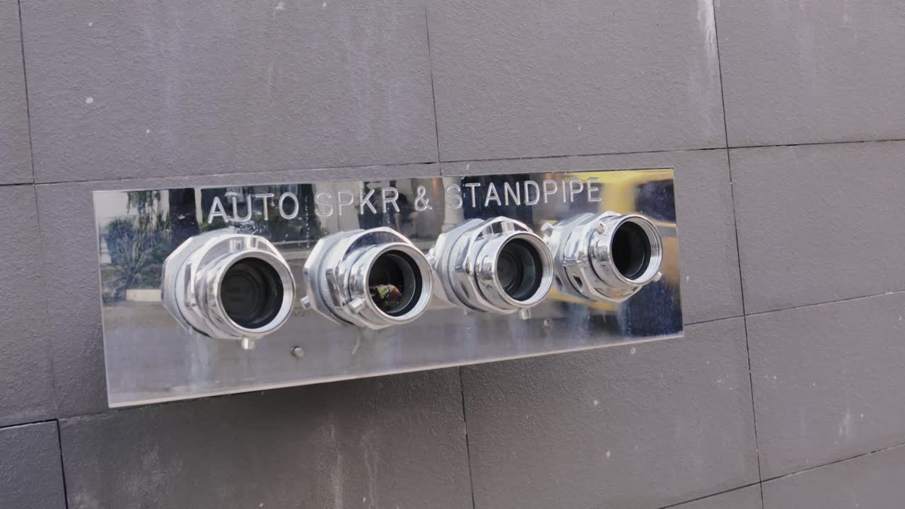 Pipe vent behind a building