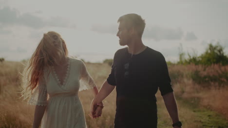 happy lovers going forward walking and dancing smiling and laughing