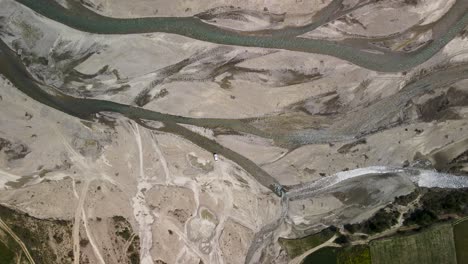 camper on dry river banks