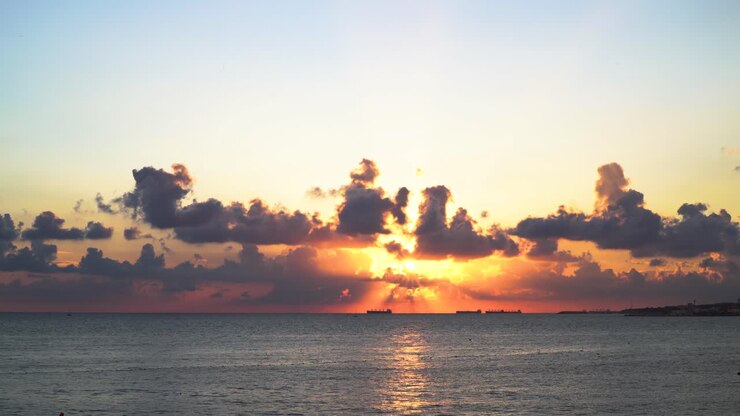Sunset over the Ocean with Ships