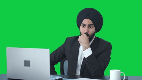 Confused-Sikh-Indian-businessman-thinking-Green-screen