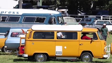 classic vehicles displayed at an outdoor event