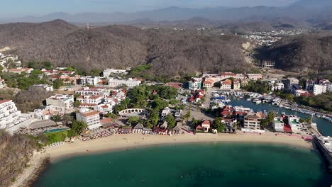 bahia de santa cruz huatulco, oaxaca, revealing charming town of huatulco shown below