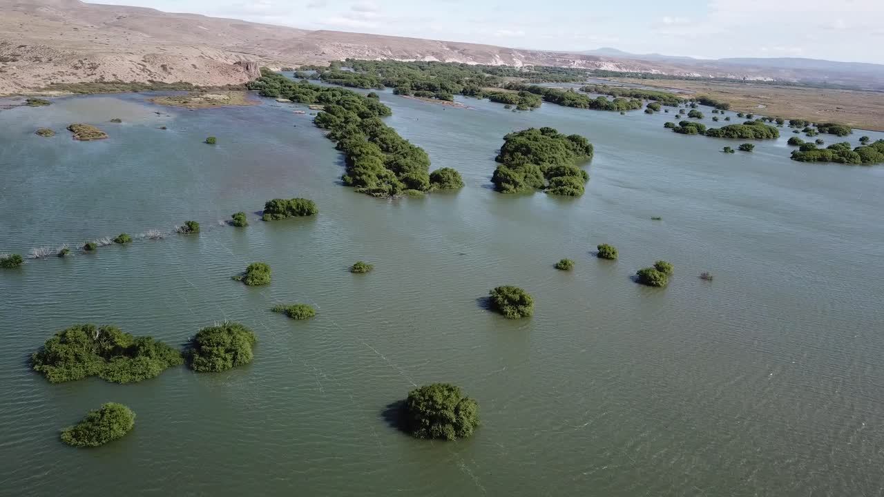 Aerial View of Lake Under Desert Patagonian Hills. Small Oasis in Dry Landscape of Argentina