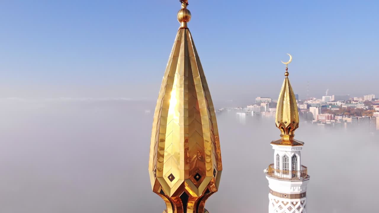 Golden crescent on the mosque tower